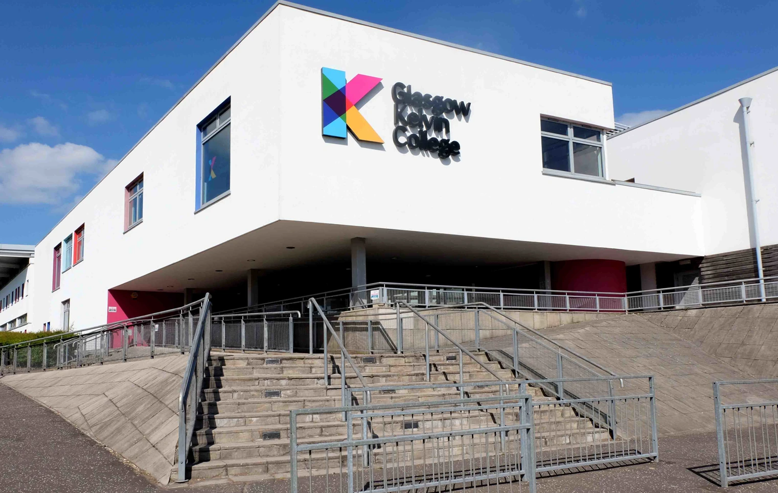 Exterior view of Glasgow Kelvin College East End Campus, featuring the main entrance and modern building design. Exterior view of Glasgow Kelvin College East End Campus, featuring the main entrance and modern building design.