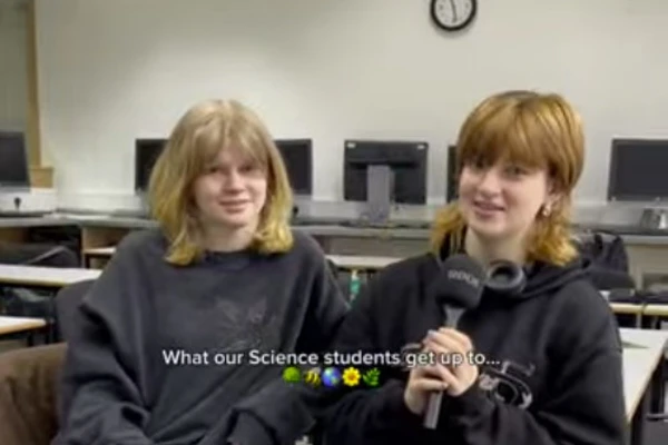 Two Applied Science students at Glasgow Kelvin College sit in a computer lab, smiling and speaking into a microphone about their experience on the course. Two Applied Science students at Glasgow Kelvin College sit in a computer lab, smiling and speaking into a microphone about their experience on the course.