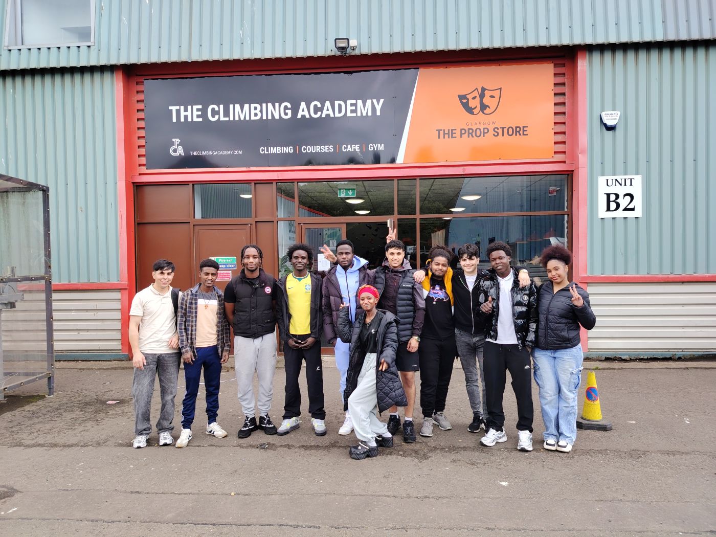 ESOL students gathered outside the Climbing Academy before taking part in climbing activities.