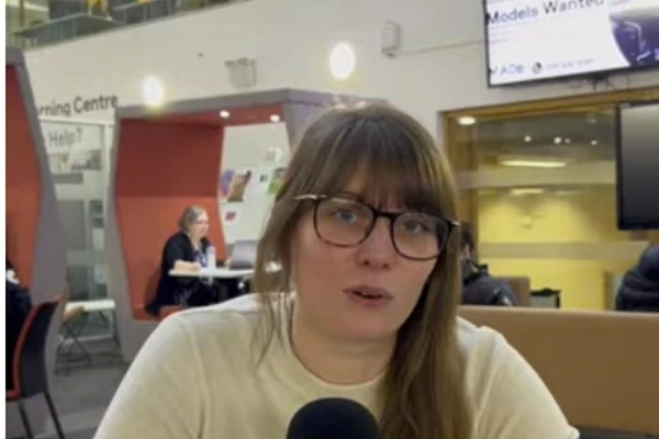 Student speaking into a microphone inside Glasgow Kelvin College’s modern atrium, reflecting on her journey into the Access to Medicine course. Student speaking into a microphone inside Glasgow Kelvin College’s modern atrium, reflecting on her journey into the Access to Medicine course.